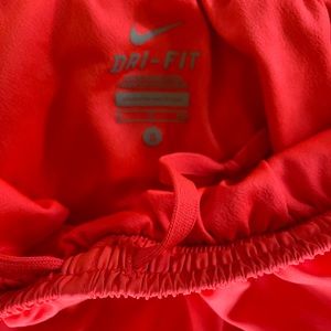 Neon Nike running shorts